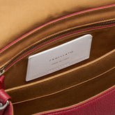 SMALL POSTINA® MESSENGER BAG IN TUMBLED LEATHER RED OPERA | Zanellato