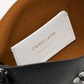 BLACK HAMMERED LEATHER SMALL LETTER CLUTCH BAG | Zanellato